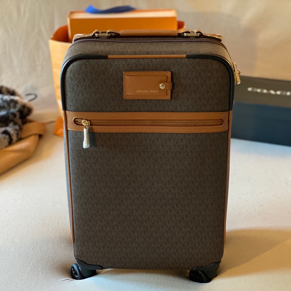 Michael Kors brand new with tags suite case